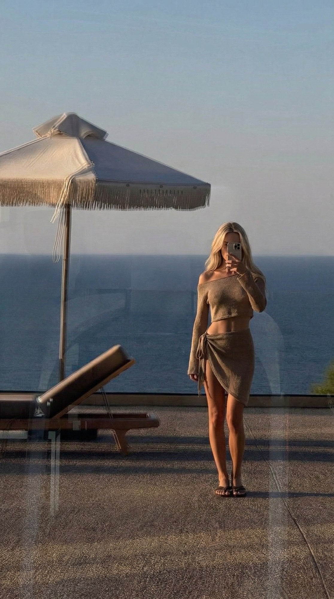 Lily Top set in sand, mirror selfie
