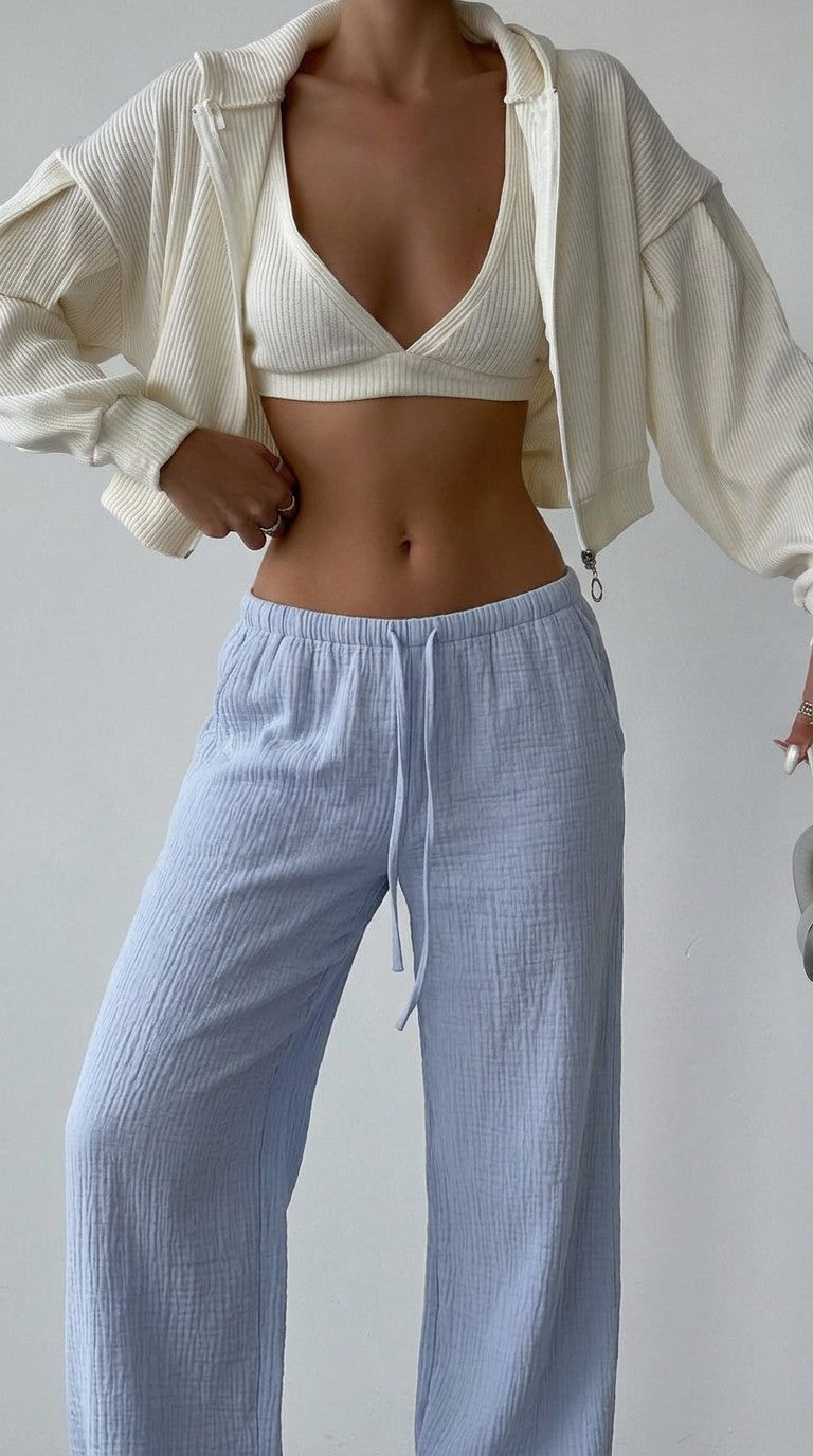 Close-up of the waist, drawstring and crinkled fabric of the Sleepy Pants