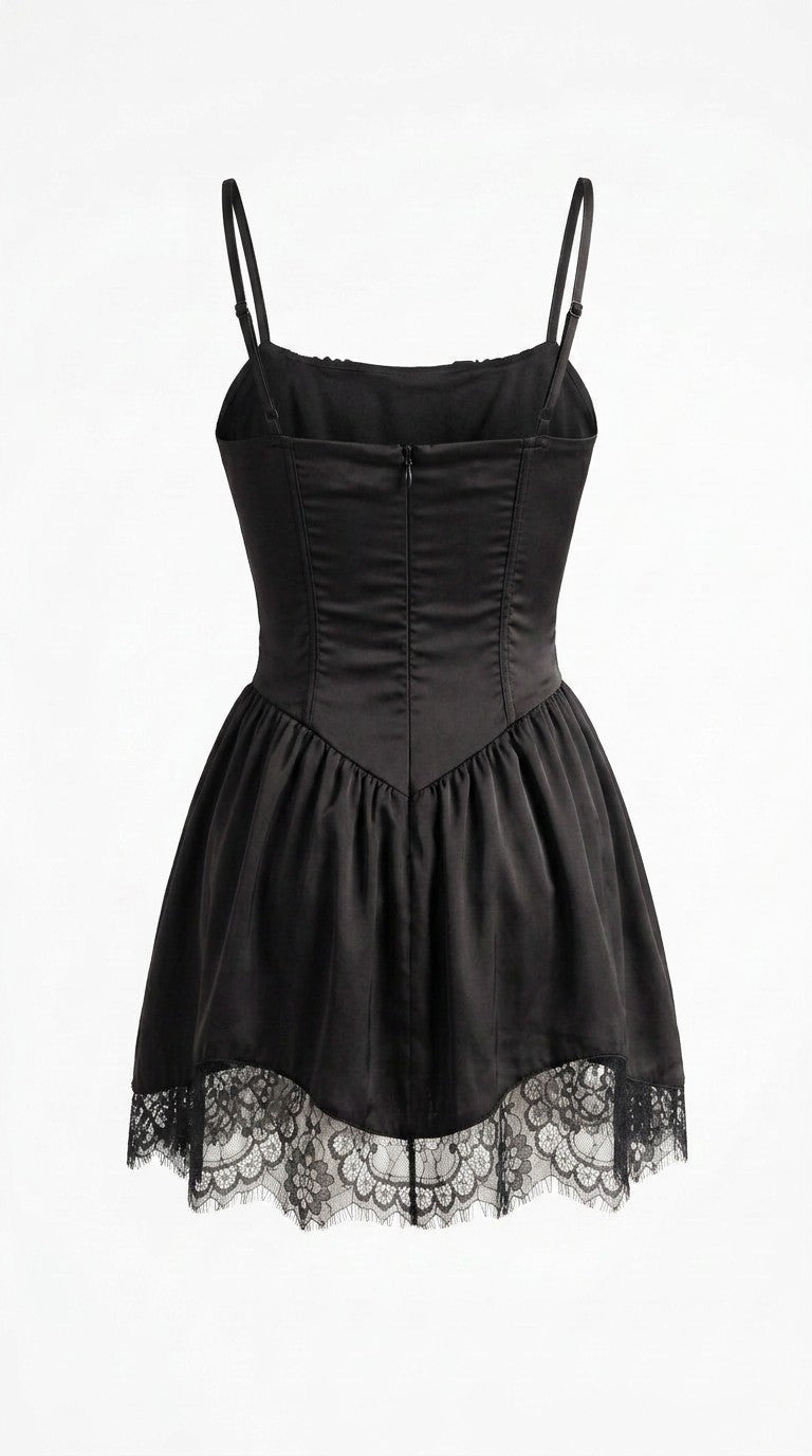 Back of the black Viviane Dress with zip and lace hem on white background